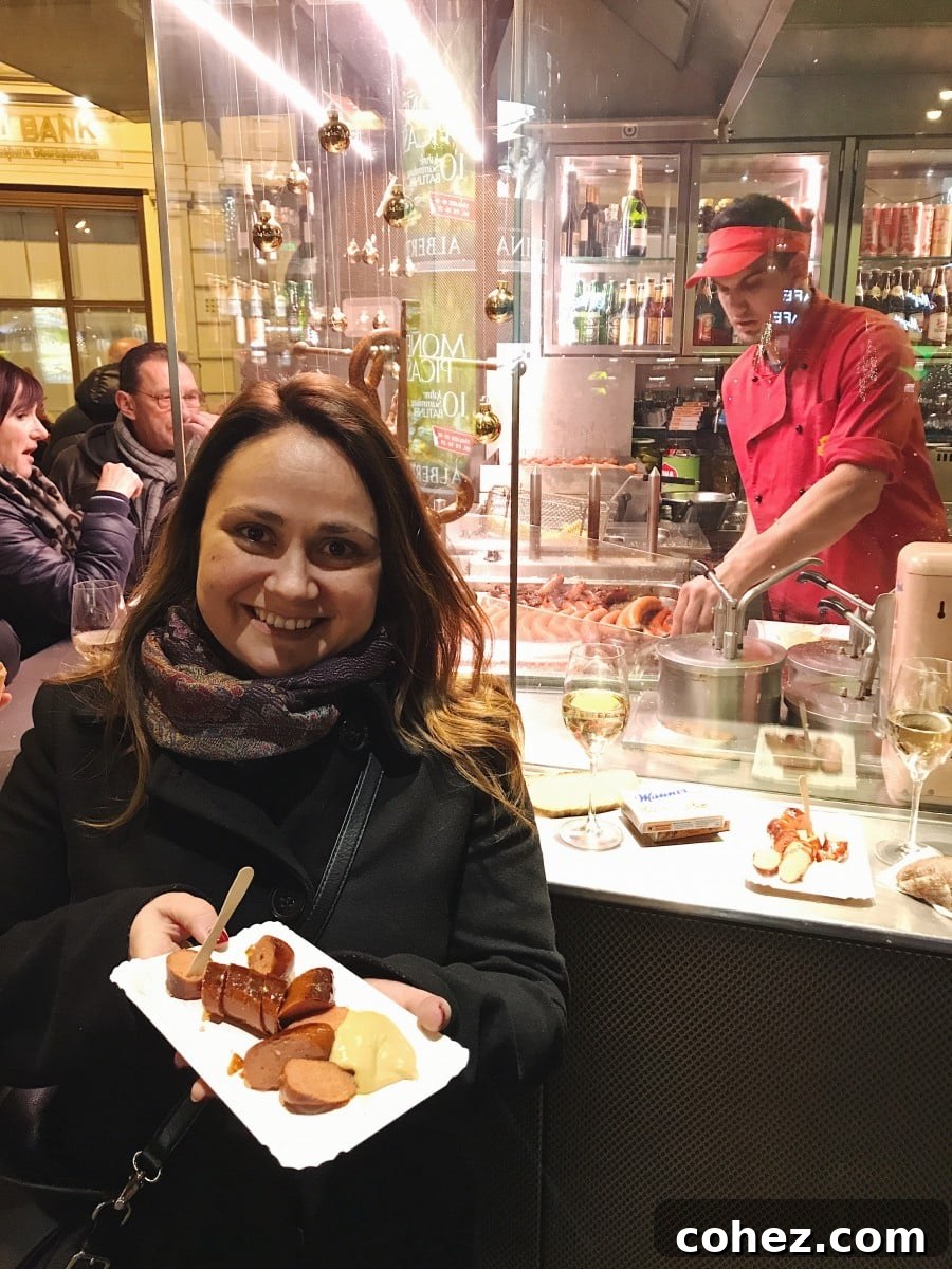 Julia enjoying a classic Austrian sausage from the famous Bitzinger stand
