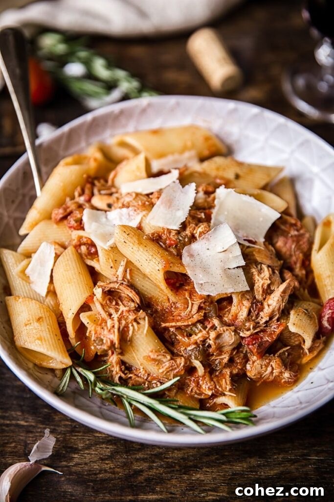 Bowl of the pasta dish with cheese shavings