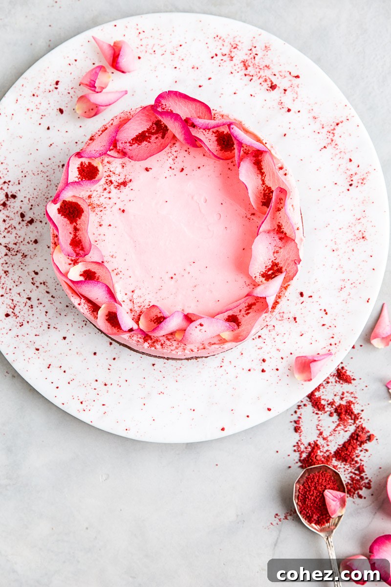 Top-down view of a pink cake, elegantly prepared and decorated for Valentine's Day celebrations.