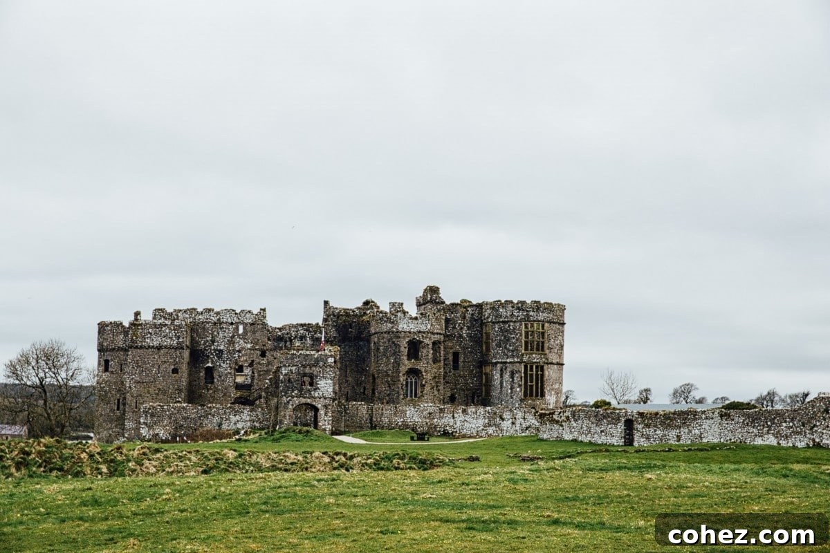 Front view of Carew Castle, an atmospheric ruin set against a scenic backdrop