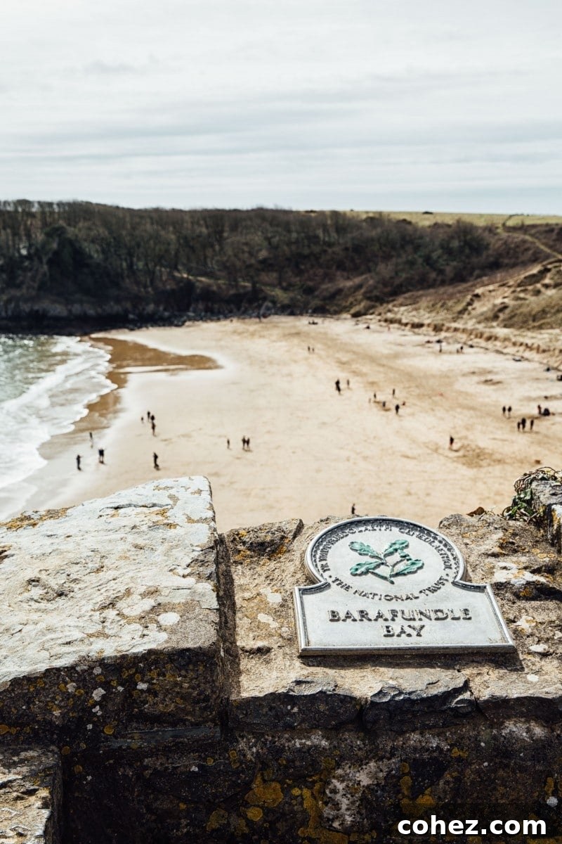 Idyllic view of Barafundle Bay with directional sign, promising pristine beauty