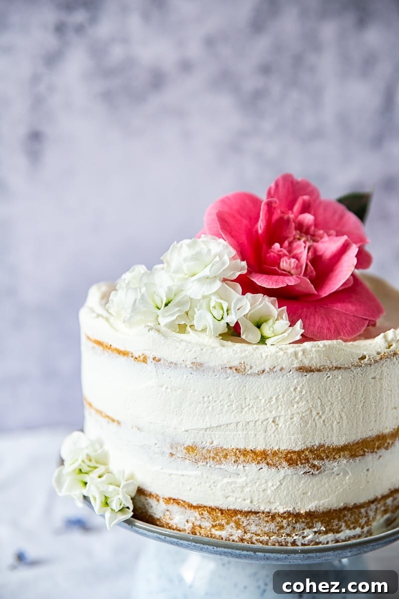 The Royal Bloom Elderflower and Lemon Cake 2 Elderflower, Lemon and Summer Berry Cake (The Royal Wedding Cake) - a beautiful, light, and refreshing dessert adorned with fresh berries and flowers.