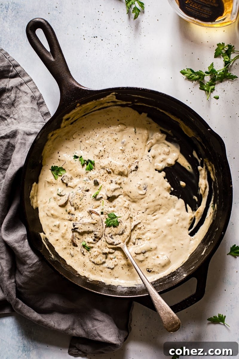 Top down view of mushroom steak sauce in a cast iron pan