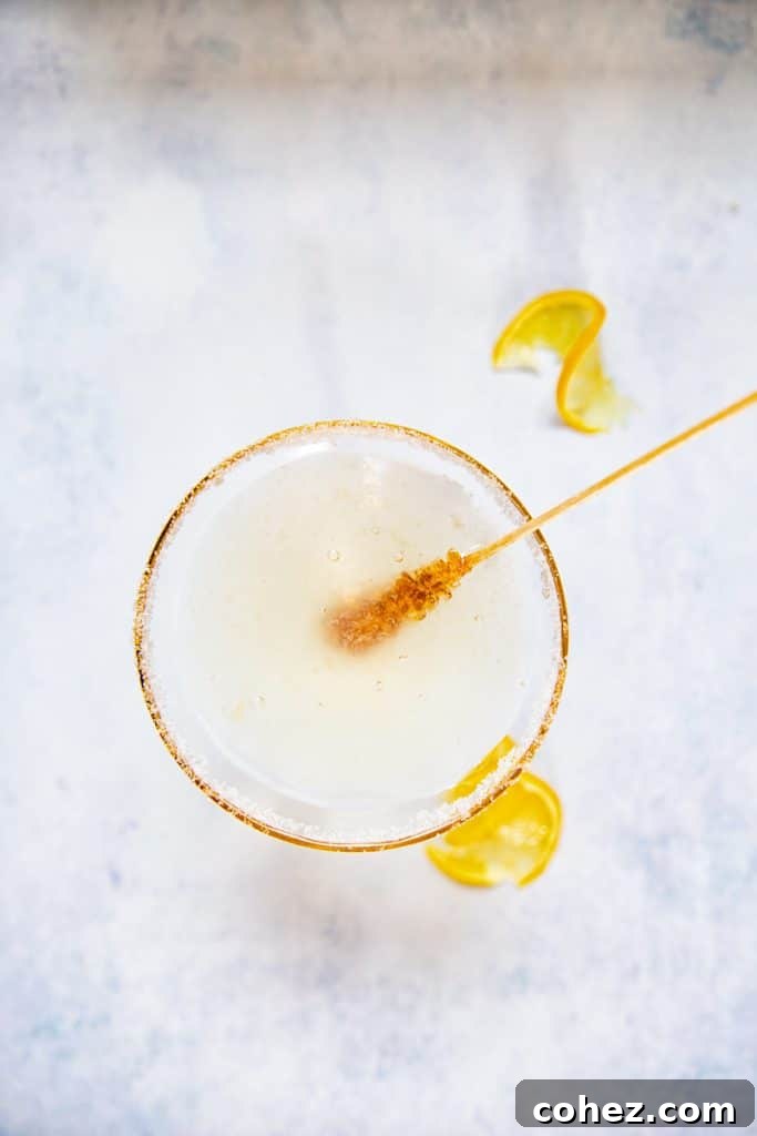 Top down view of stir stick in Lemon drop martini