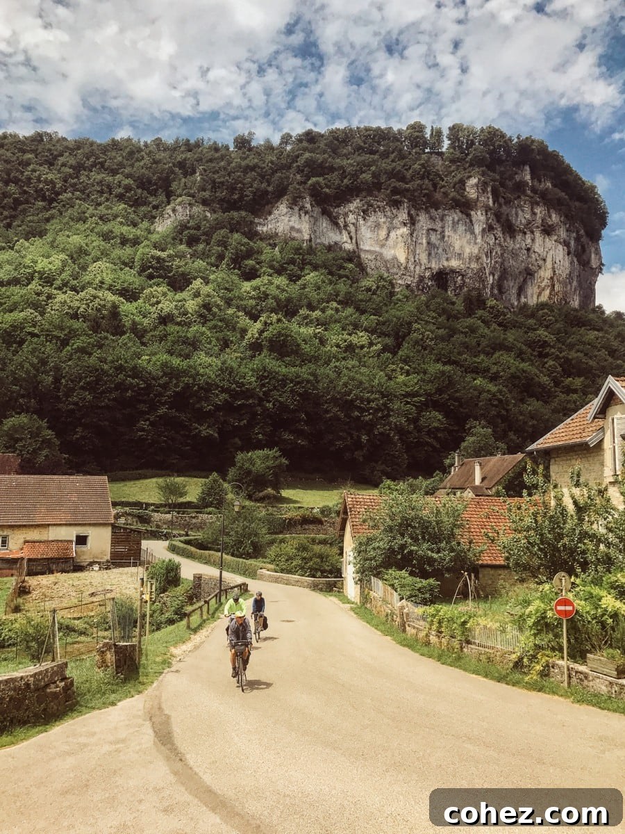 A final, sweeping picturesque view of the tranquil Jura landscape, emphasizing its untouched natural beauty and inviting serenity.