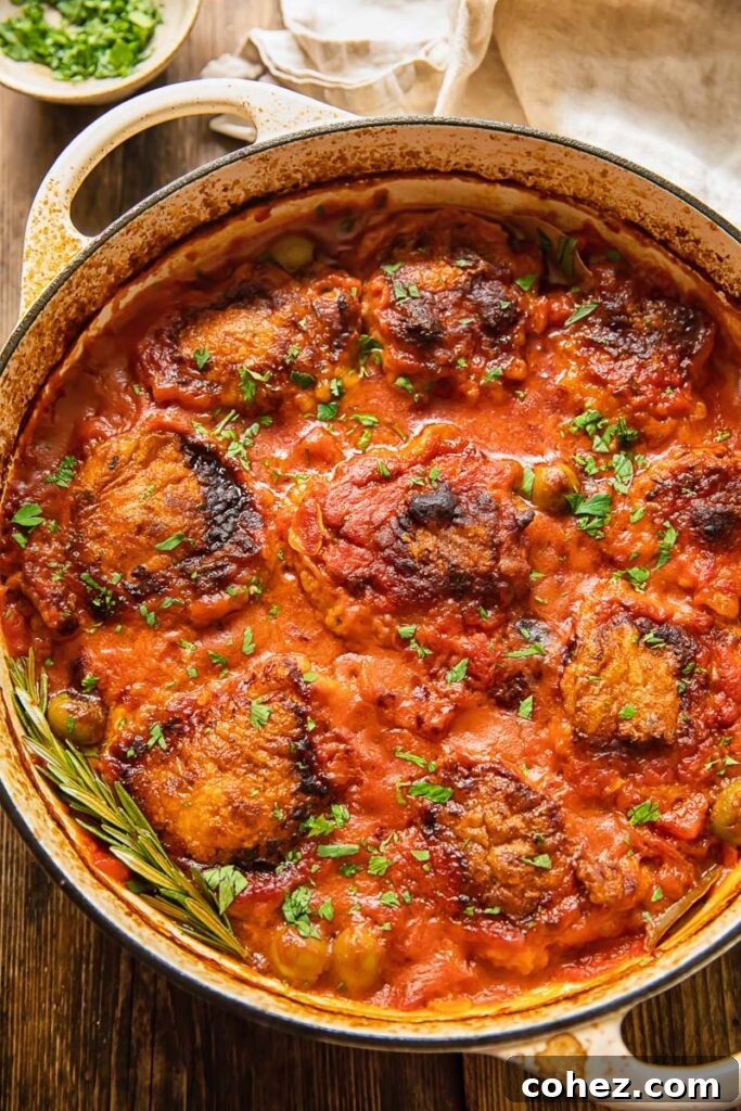 chicken cacciatore in a white pan