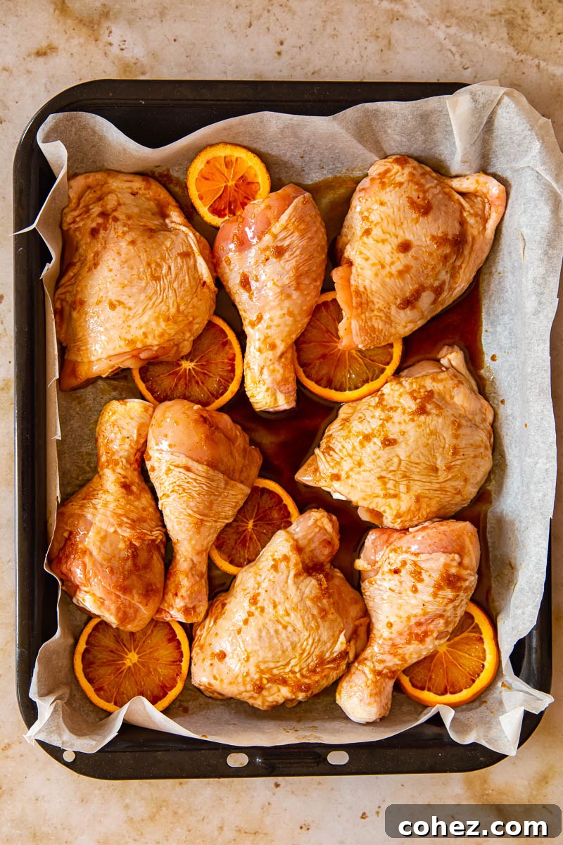 Sticky Honey Soy Glazed Chicken Thighs and Drumsticks 5 Unbaked honey soy chicken in roasting pan