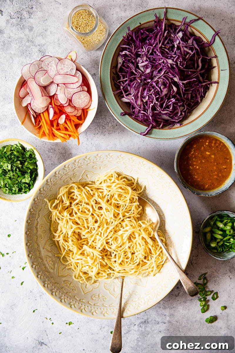 Ingredients in bowls for Asian Noodle Salad