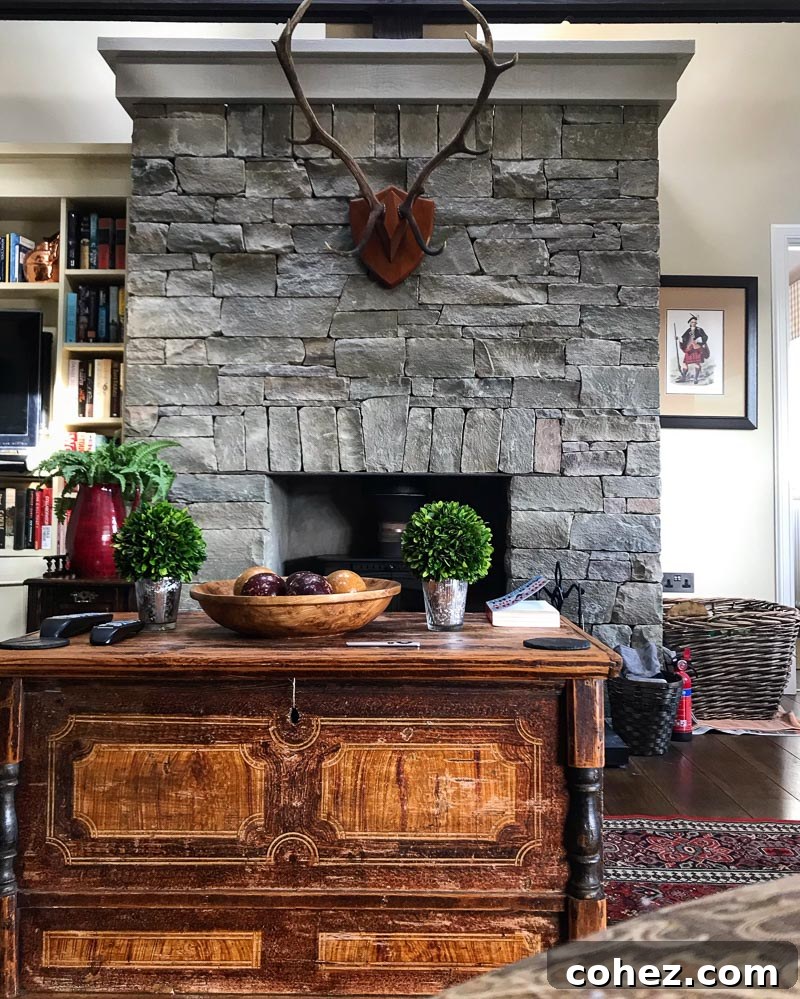 Isle of Mull Scotland's Untamed Beauty 6 The warm and inviting interior of a living room at Ardfenaig Lodge, featuring comfortable sofas, a fireplace, and rustic decor, creating a cozy atmosphere.