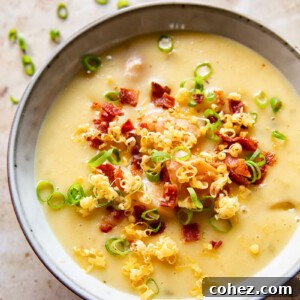 Potato Soup topped with bacon bits, green onions and grated cheese