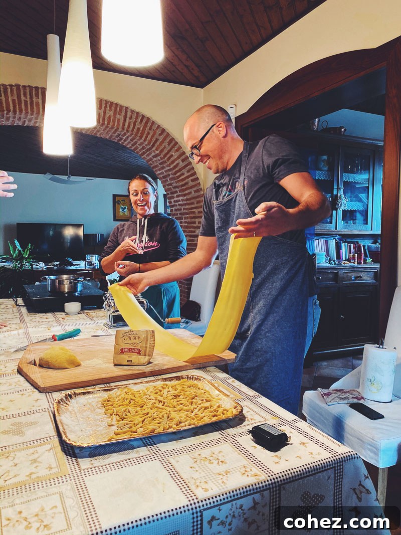 A man passionately making fresh pasta by hand during a cooking class in Campania, Italy