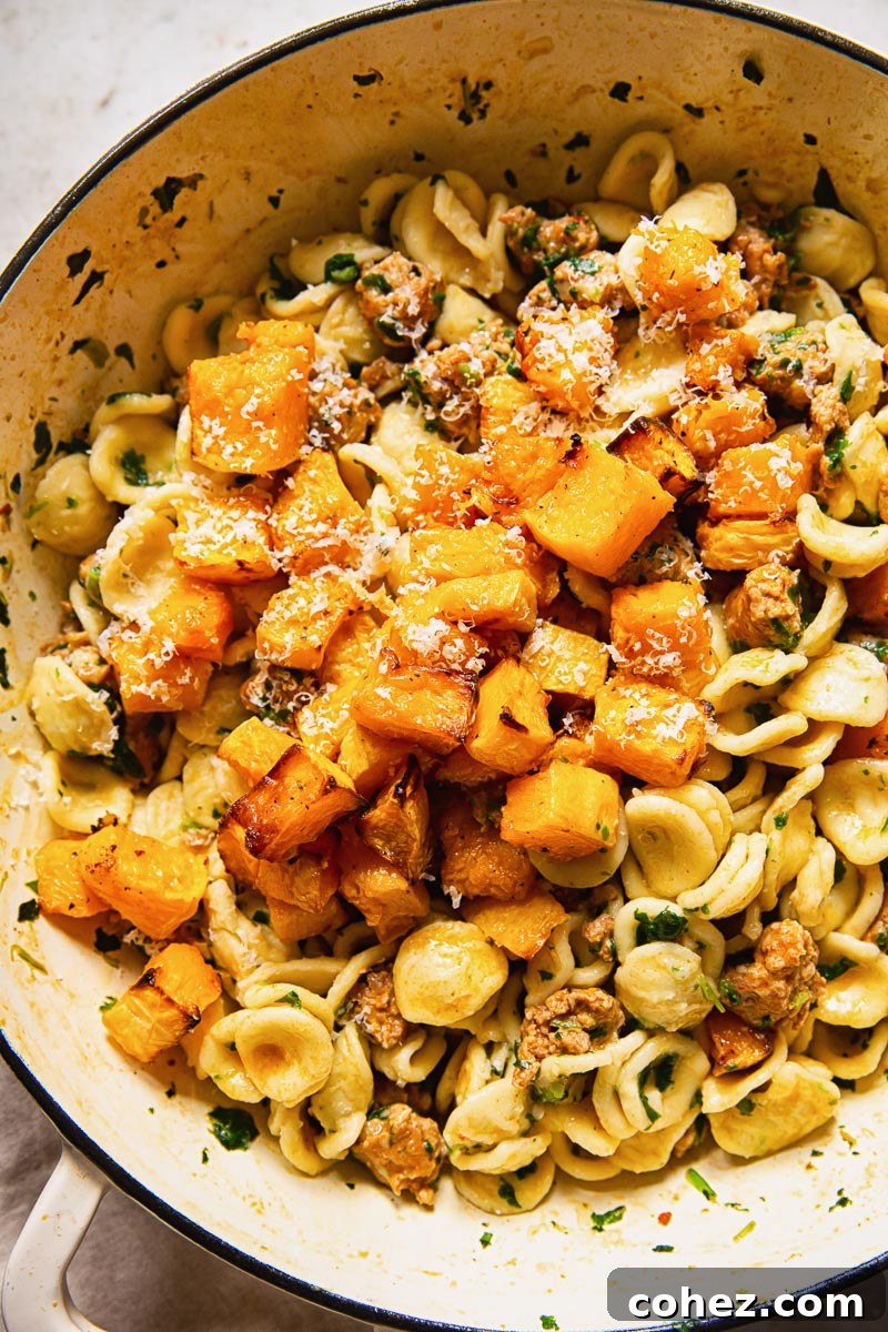 Butternut squash and chorizo sausage mixed with orecchiette pasta and spinach