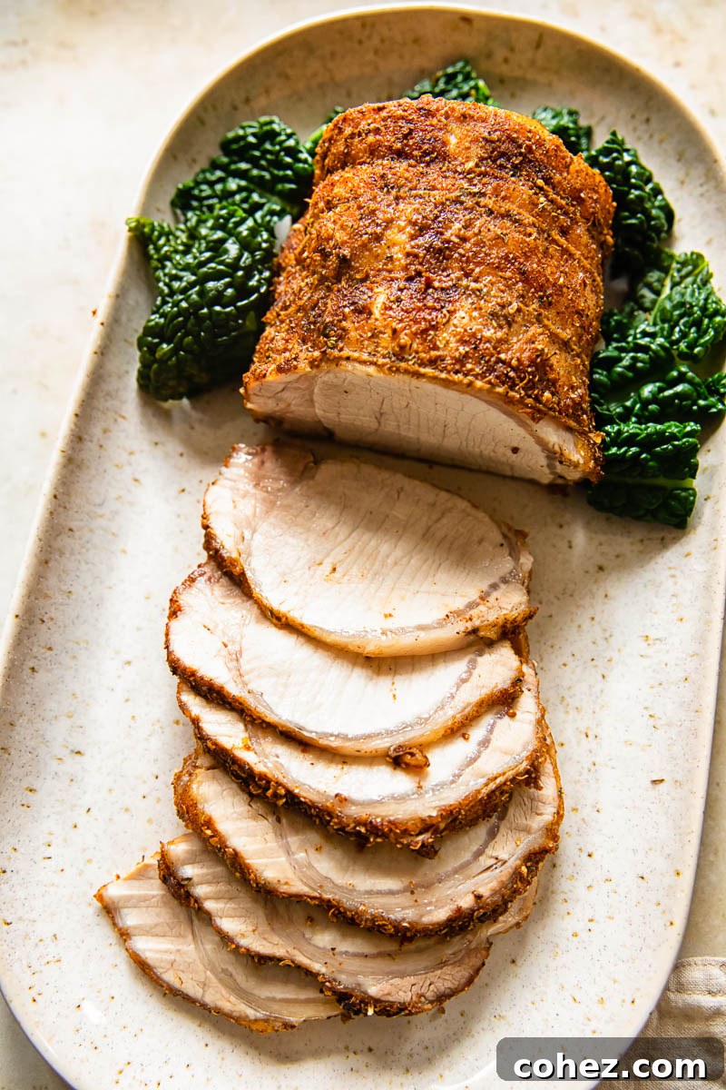 Succulent Pork Loin with Rich Pan Gravy 3 top down view of roasted and partially sliced pork loin