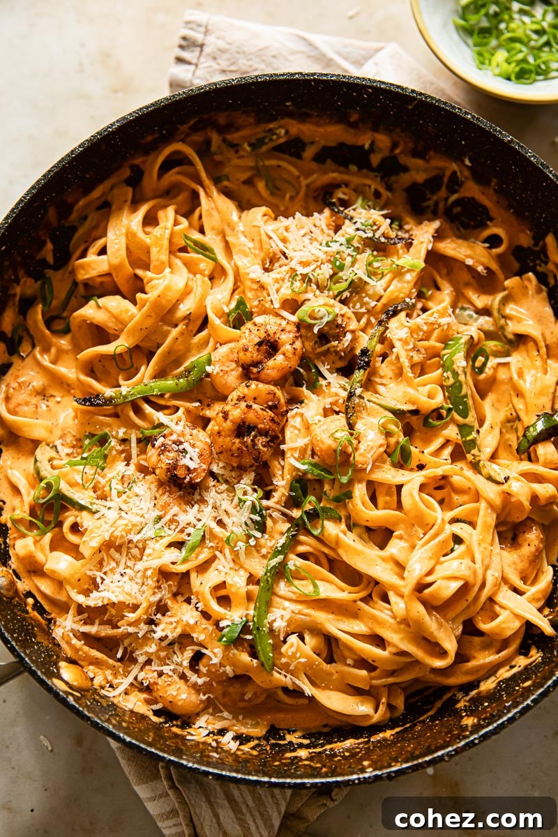 creamy tagliatelle pasta with shrimp, green onions and green peppers