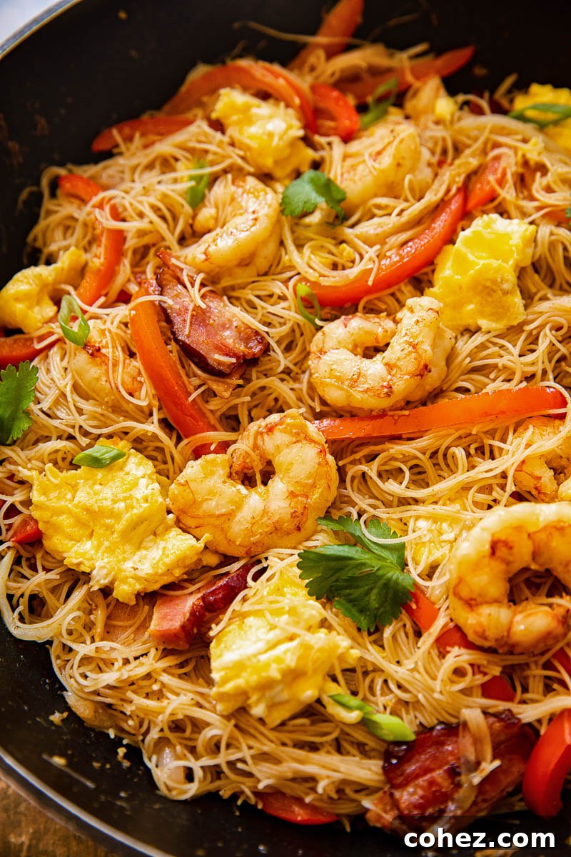 Singapore noodles in a wok