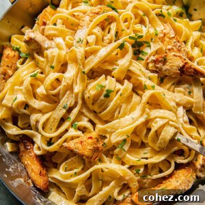 creamy pasta with chicken in a pan