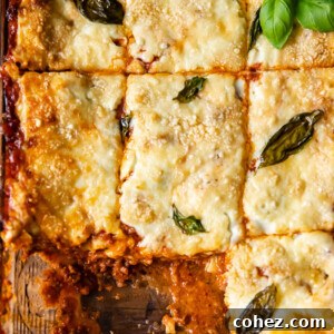 top down view of lasagne in a pan cut into squares