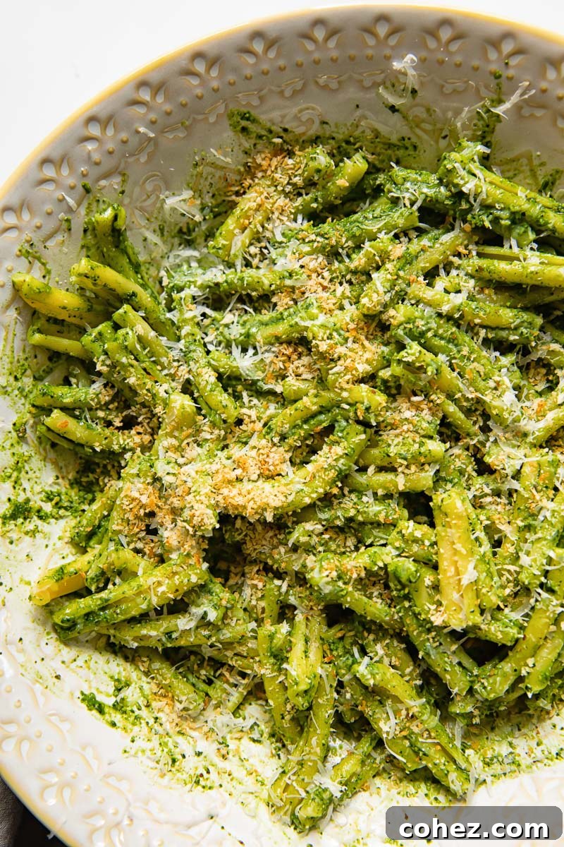 top down view of kale pesto pasta with breadcrumbs