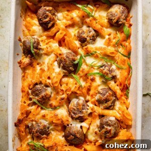 top down view of baked pasta with meatballs in a pan