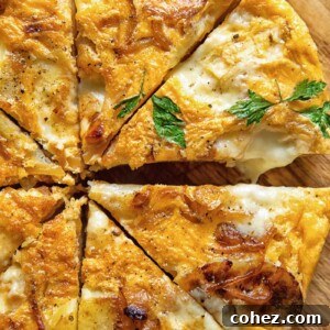 partial view of frittata cut into wedges