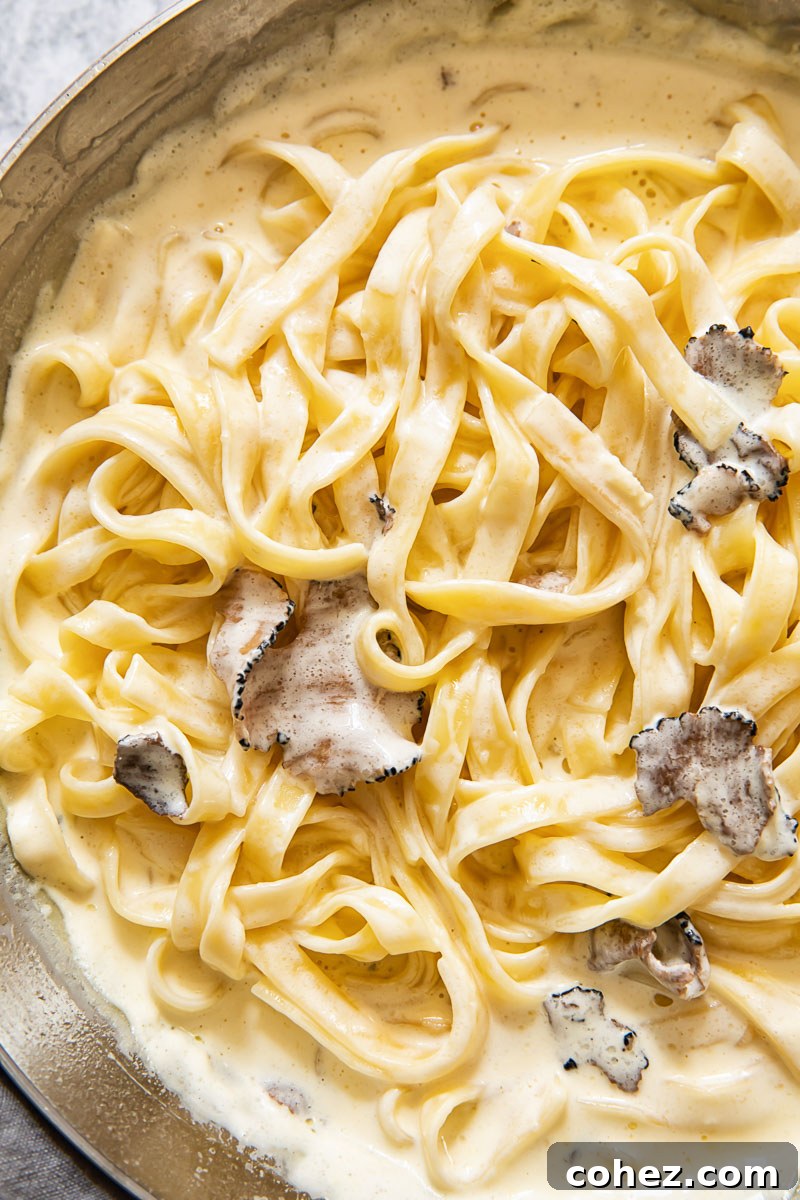 Close up of tagliatelle with truffle sauce in a pan