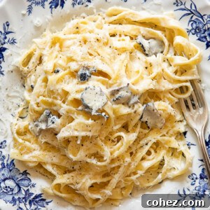 Top down view of tagliatelle pasta with truffle sauce on a plate