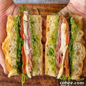 cross section of focaccia sandwich with deli meats and cheese
