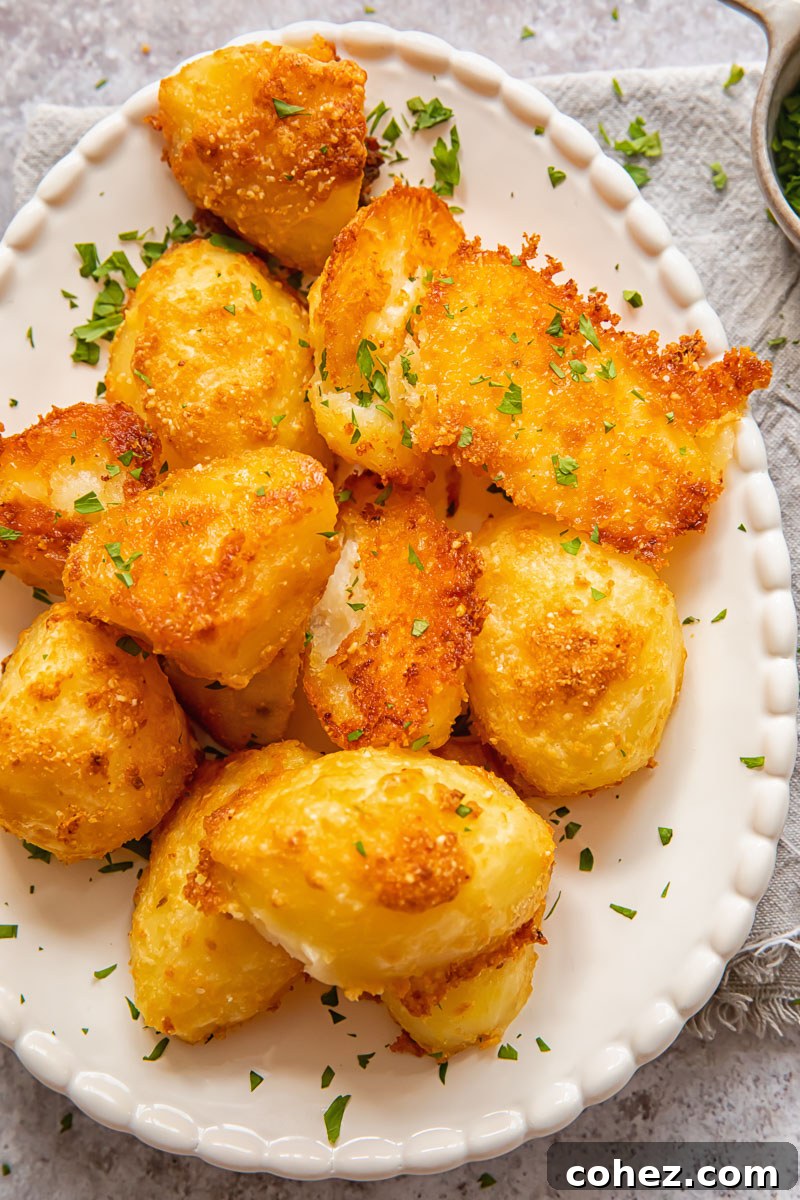 Crispy Parmesan Roasted Potatoes 2 Close up shot of parmesan crusted potatoes showing their golden, crispy exterior