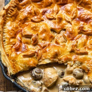 Chicken and mushroom pie with one slice removed