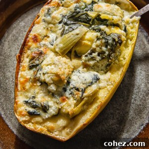 Spaghetti sauce on stuffed with spinach and artichoke on a plate