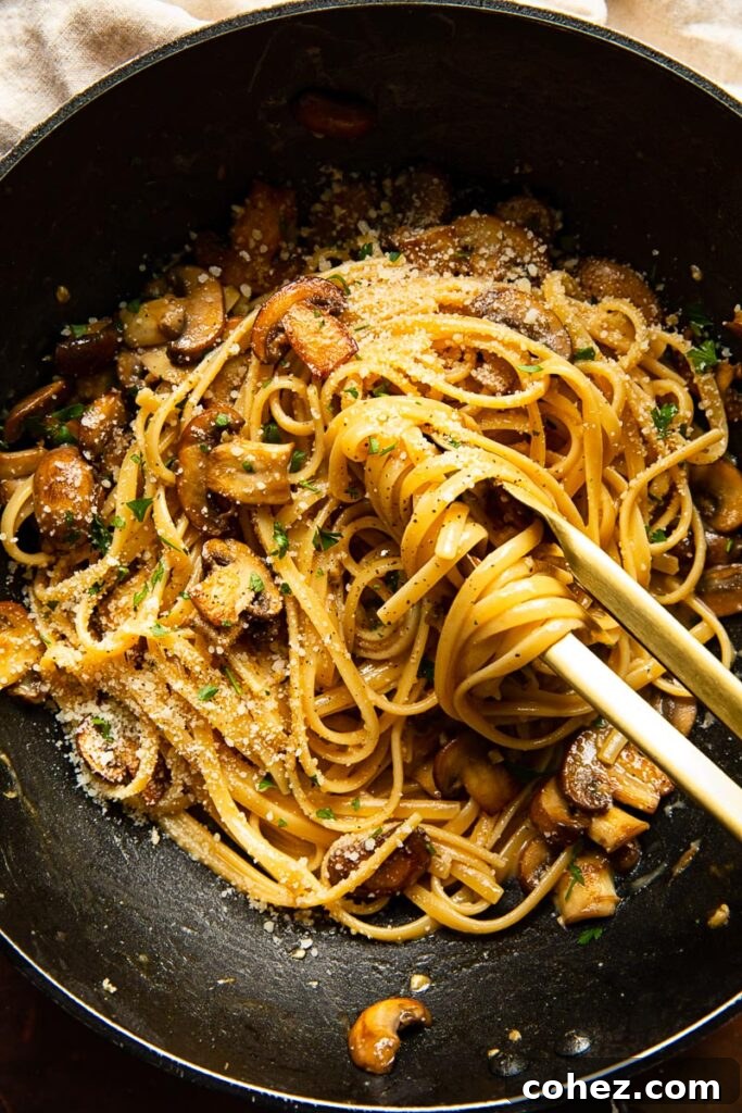 Top down of mushroom carbonara in a pan