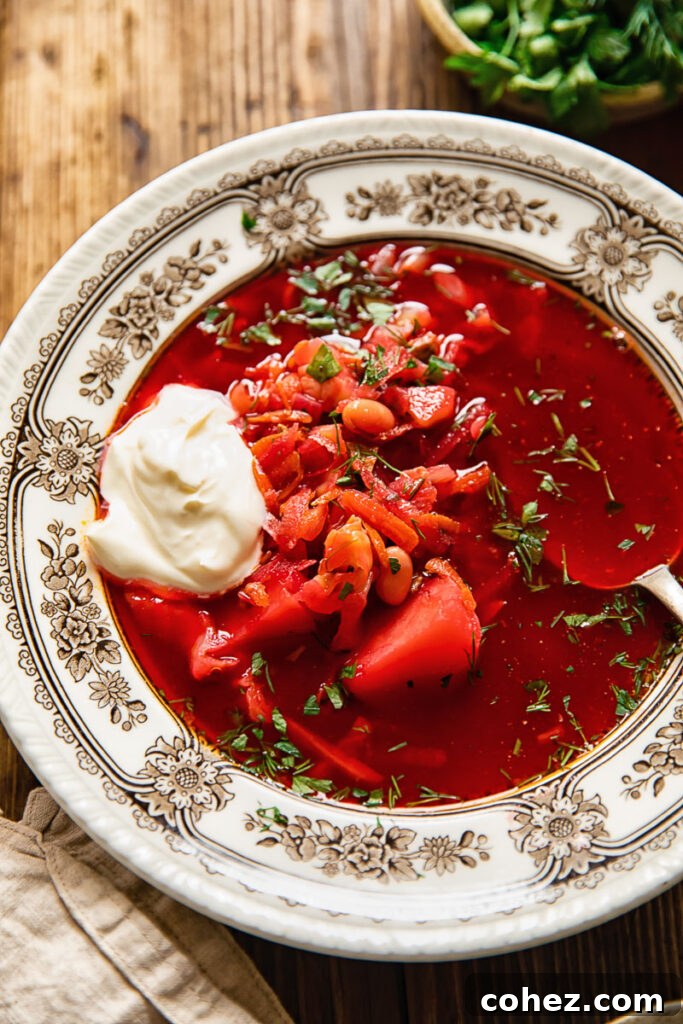 bowl of vegetarian borscht with sour cream