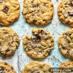 Top down shot of chocolate chip cookies laid out on a baking sheet