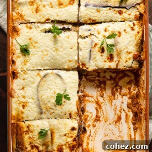 Plant-Powered Moussaka 7 Vegetarian moussaka in a baking dish with pieces removed