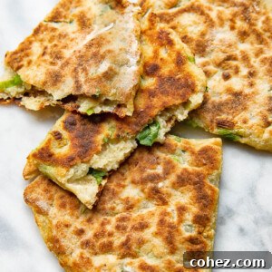 Golden Irish Potato Griddlecakes 6 Close up shot of cut open pieces of irish potato farls stack on top each other