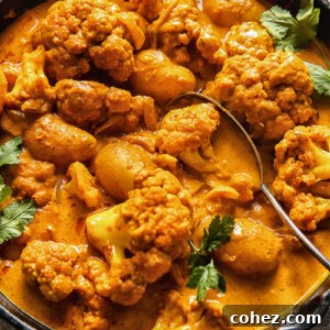 cast iron pan with potato cauliflower tikka masala