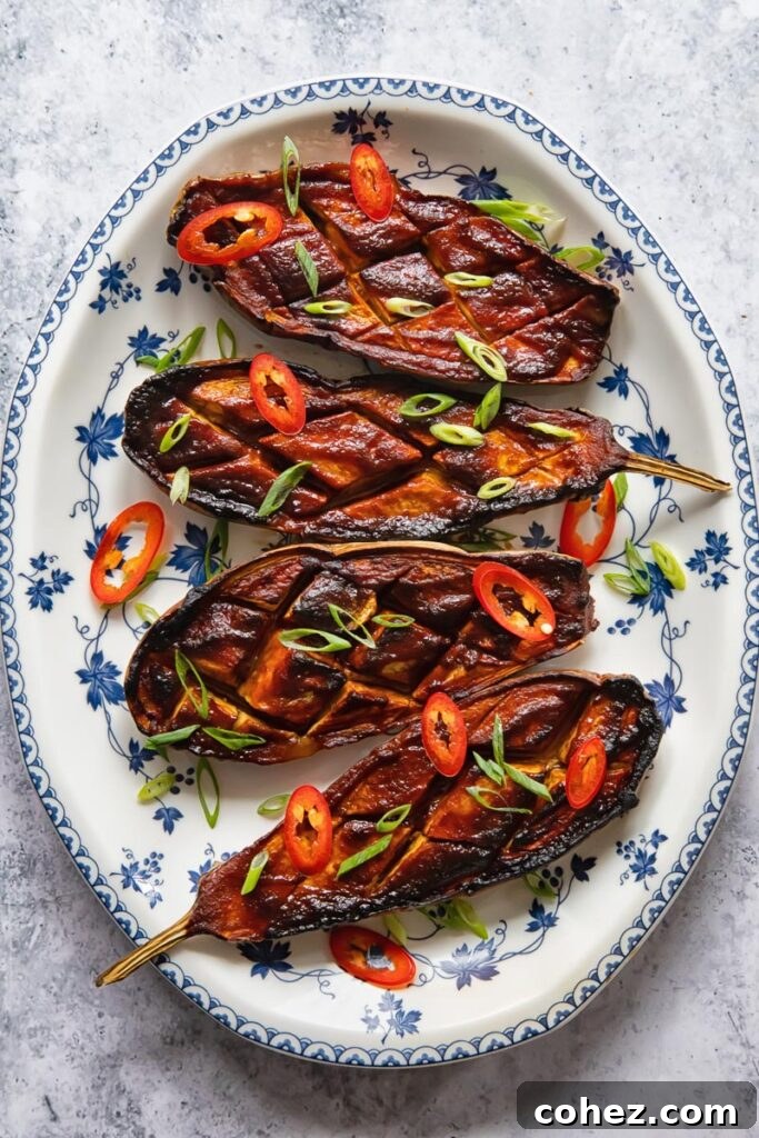 top down of a plate of four miso glazed aubergine