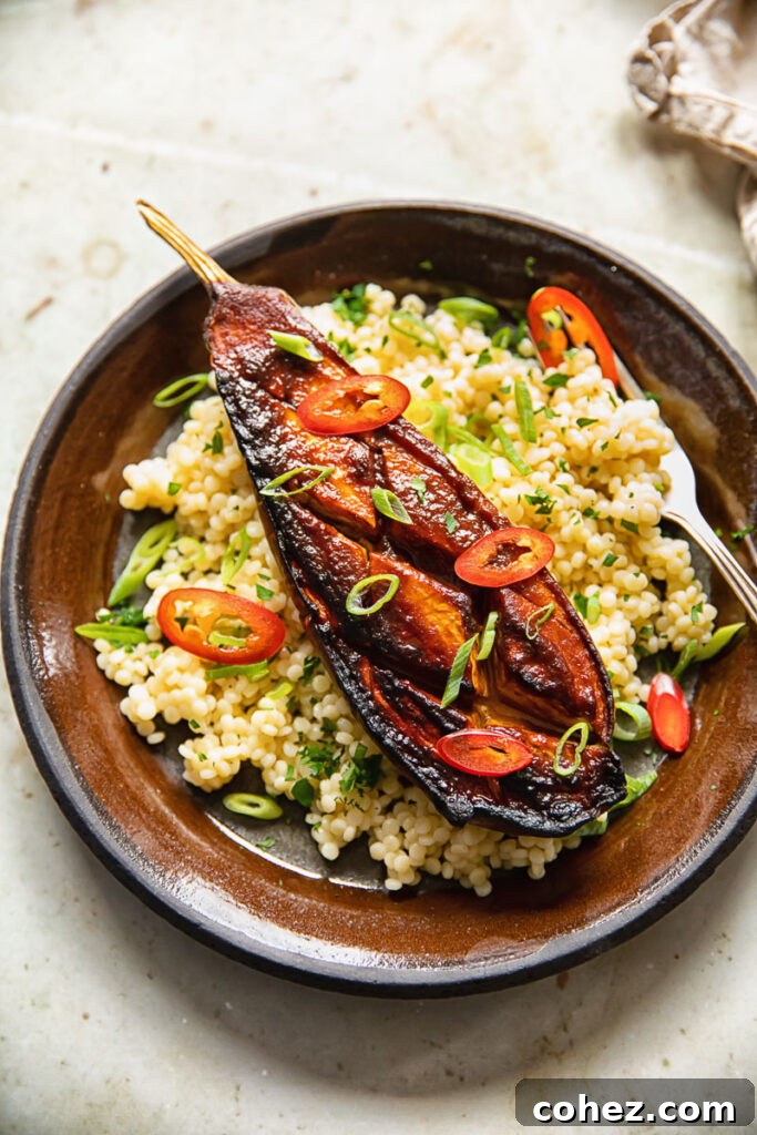Miso-glazed aubergine on a bed of couscous