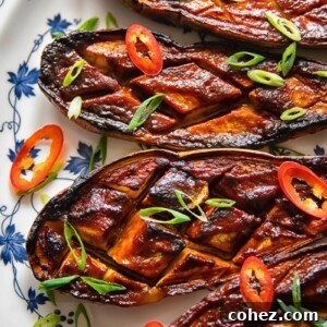 four glazed eggplant on a plate from close up