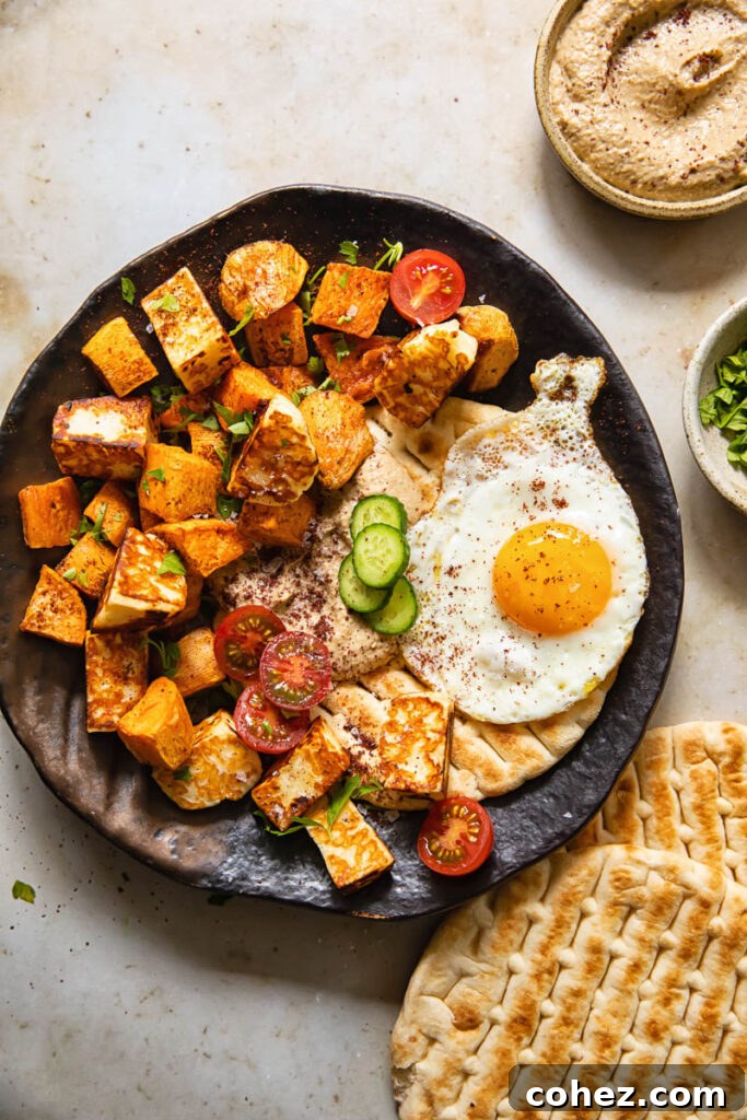 Golden Sweet Potato Hash with Pan-Seared Halloumi and Smoky Baba Ganoush 6 A plate of sweet potato hash with baba ganoush and flatbread