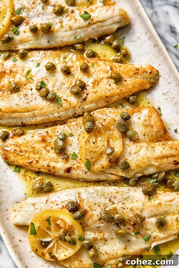 close up of sea bass fillets in brown butter caper sauce