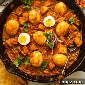 Effortless Egg, Pea, and Potato Curry 6 Egg curry in a cast iron frying pan