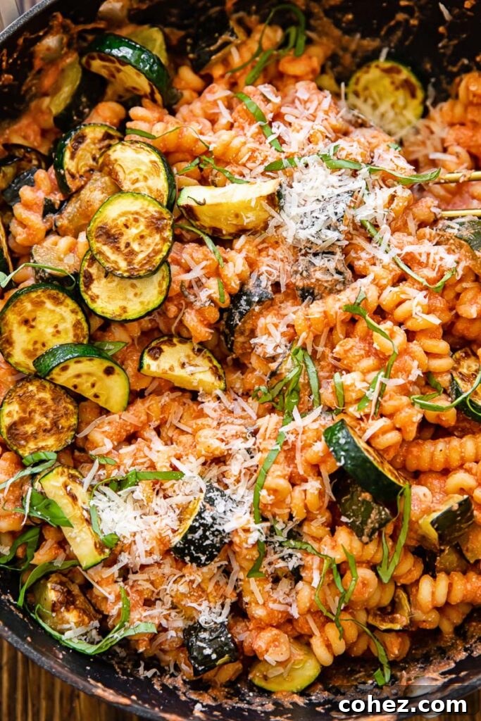 Creamy Tomato Ricotta & Zucchini Pasta for Summer 3 Close up of the courgette pasta, highlighting the creamy sauce and zucchini pieces