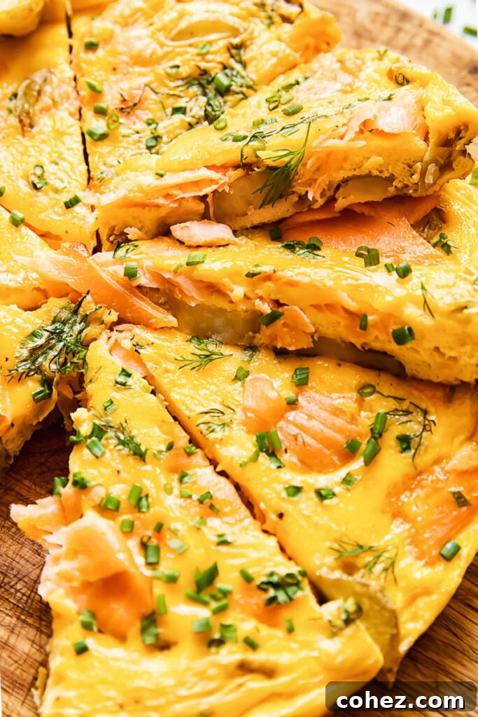 Close up shot of salmon frittata slices cross section stacked on top of each other