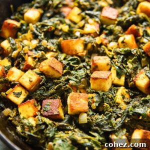 Heaps of Saag Paneer in a pan, a classic Indian vegetarian dish.