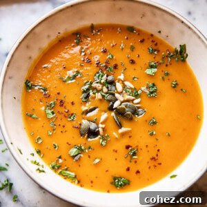 Zingy Sweet Potato Carrot Soup 6 Bowl of sweet potato and carrot soup topped with seeds