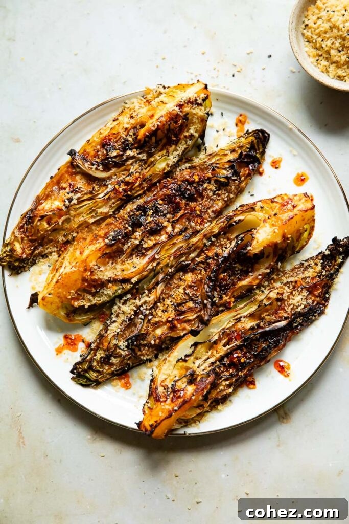 Gochujang Cabbage with Golden Crunch 3 Top down shot of gochujang cabbage wedges on a plate