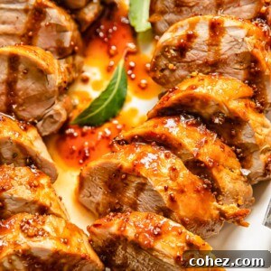 Top down shot of molasses pork loin slices on a plate