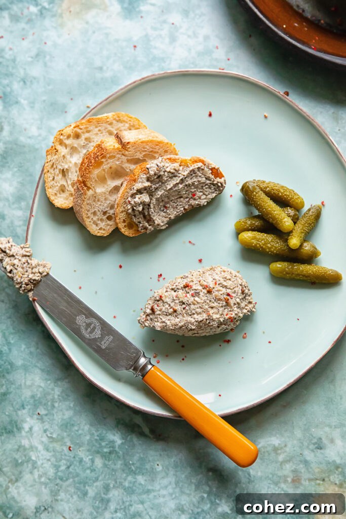 Shot of bread slices on a plate with mushroom paté spread on top
