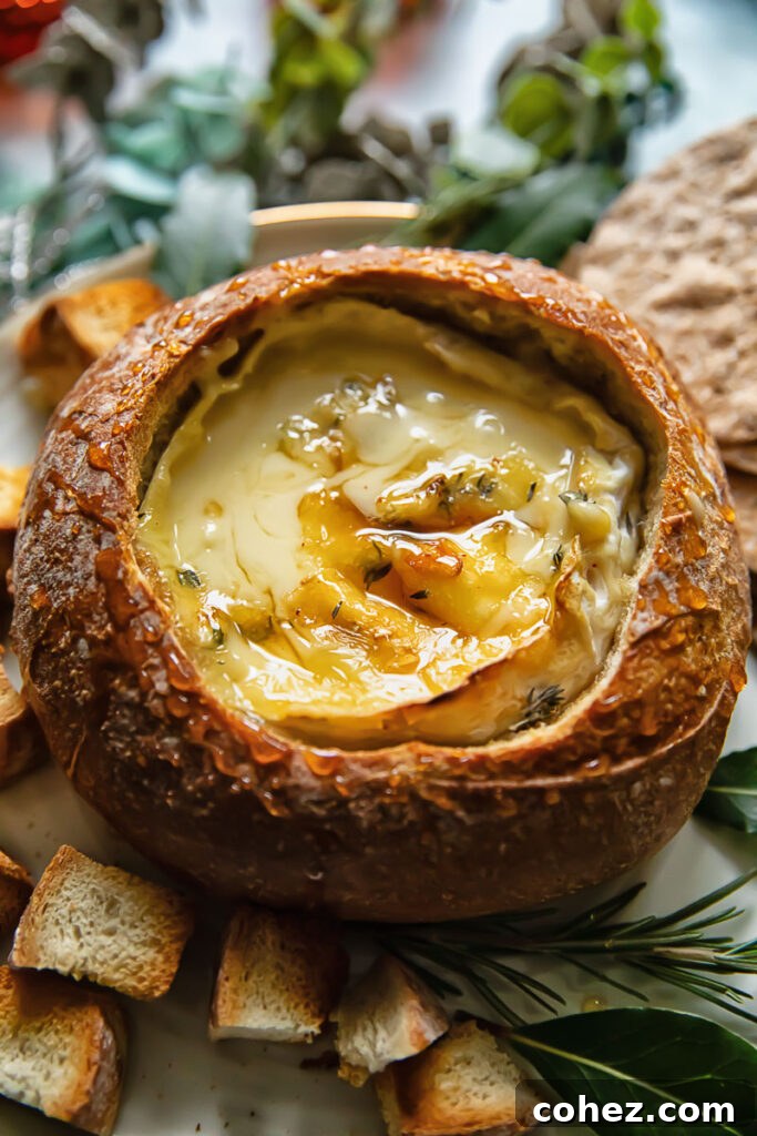 Molten Hot Honey Camembert Bread Bowl 6 baked camembert in a bread bowl next to toasted bread slices